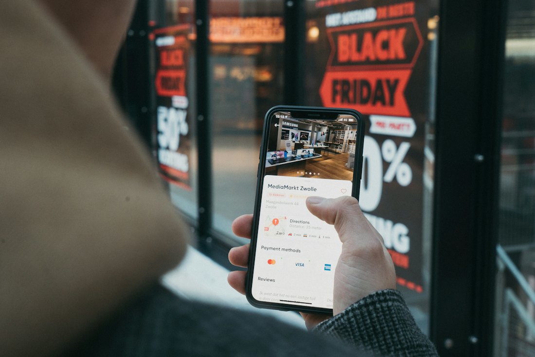 A shopper browsing an online store on her phone